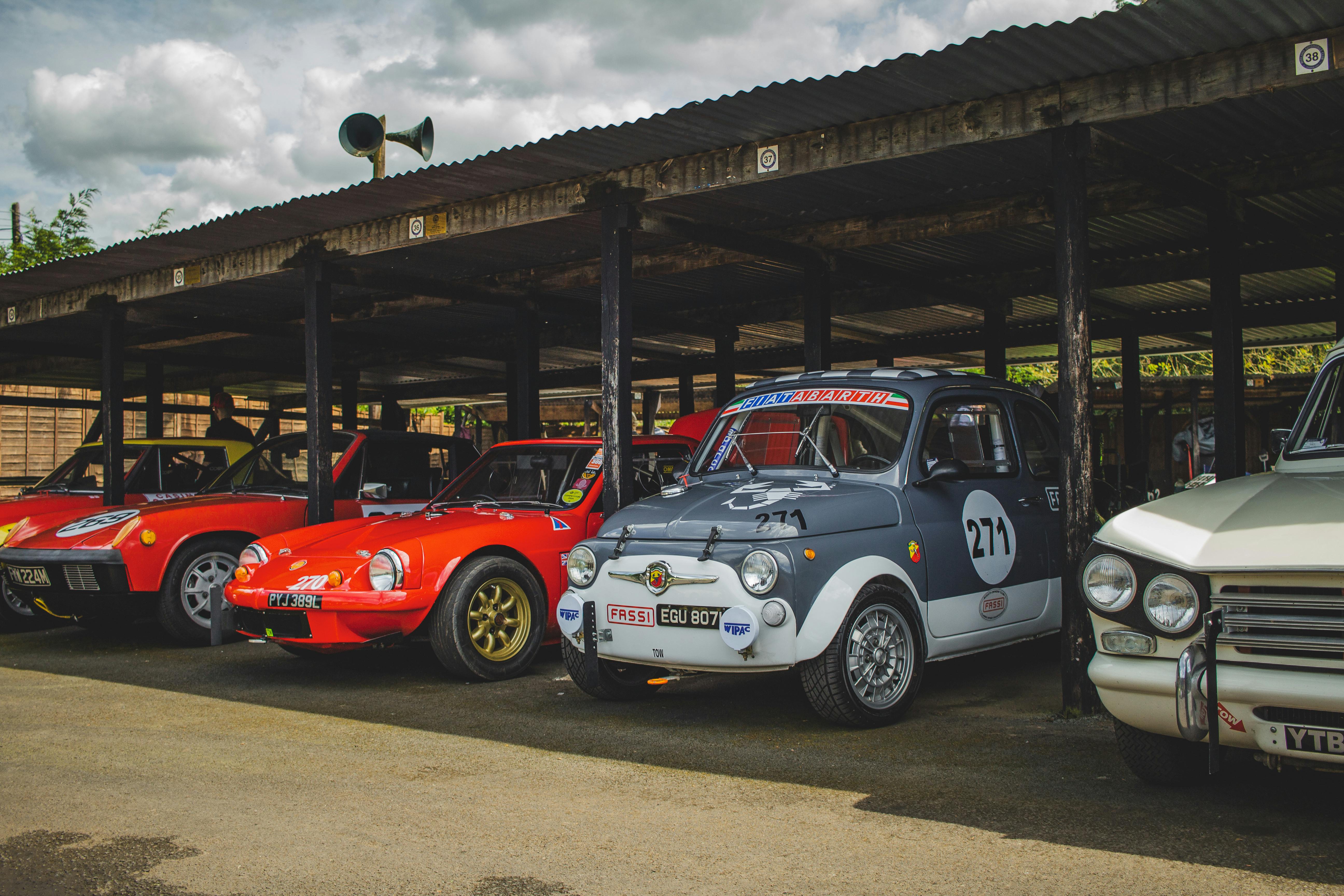 A line of Sports Cars including Fiat5 00